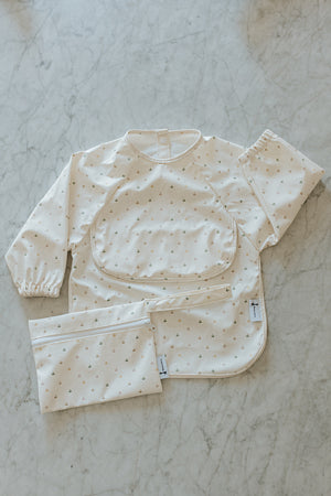 Bavette à manches longues avec pochette intégrée