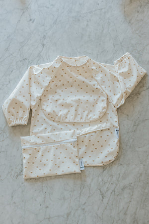 Bavette à manches longues avec pochette intégrée