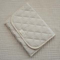 tapis de change crème