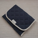 tapis de change dans le sac marine