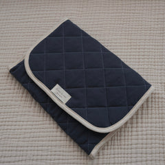 tapis de change dans le sac marine