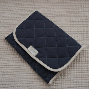 tapis de change dans le sac marine
