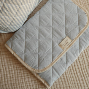 tapis de change dans le sac nuage