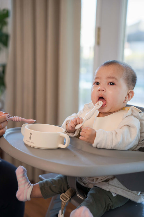 Bavoir ajustable en silicone