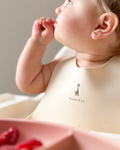 Bavoir ajustable en silicone